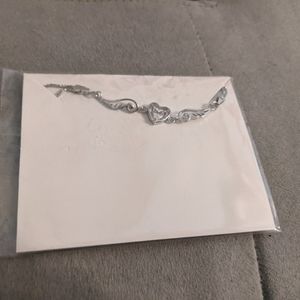 Dainty silver necklace with flower